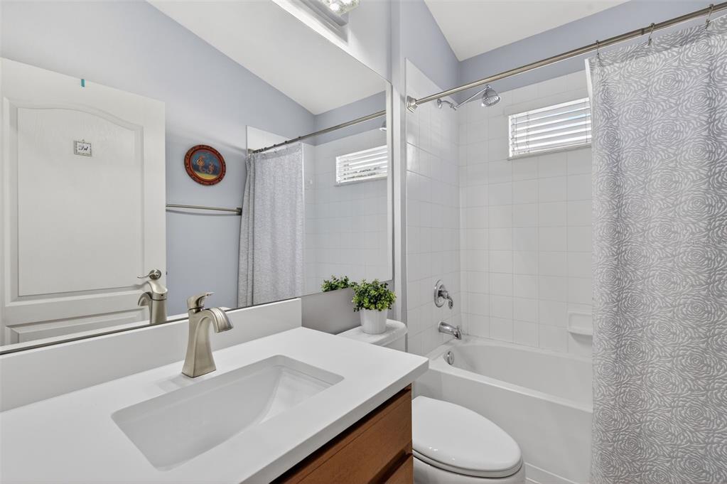 12629 White Bluff Road Hudson, FL 34669 - Photo 19 of 38 a bathroom with a sink toilet and shower