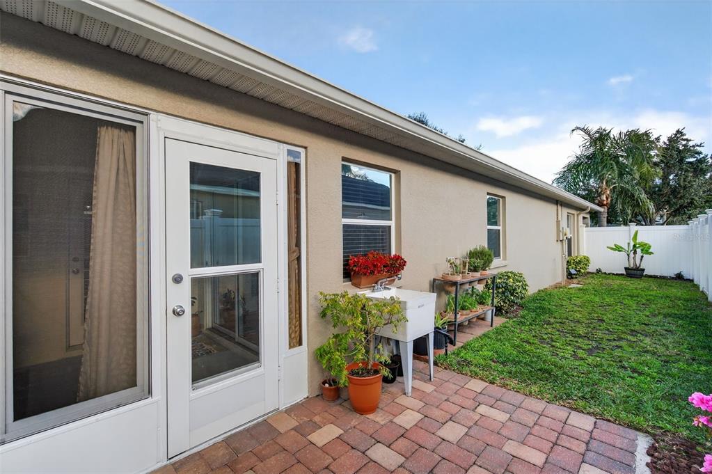 12629 White Bluff Road Hudson, FL 34669 - Photo 24 of 38 a view of a house with chair and a table