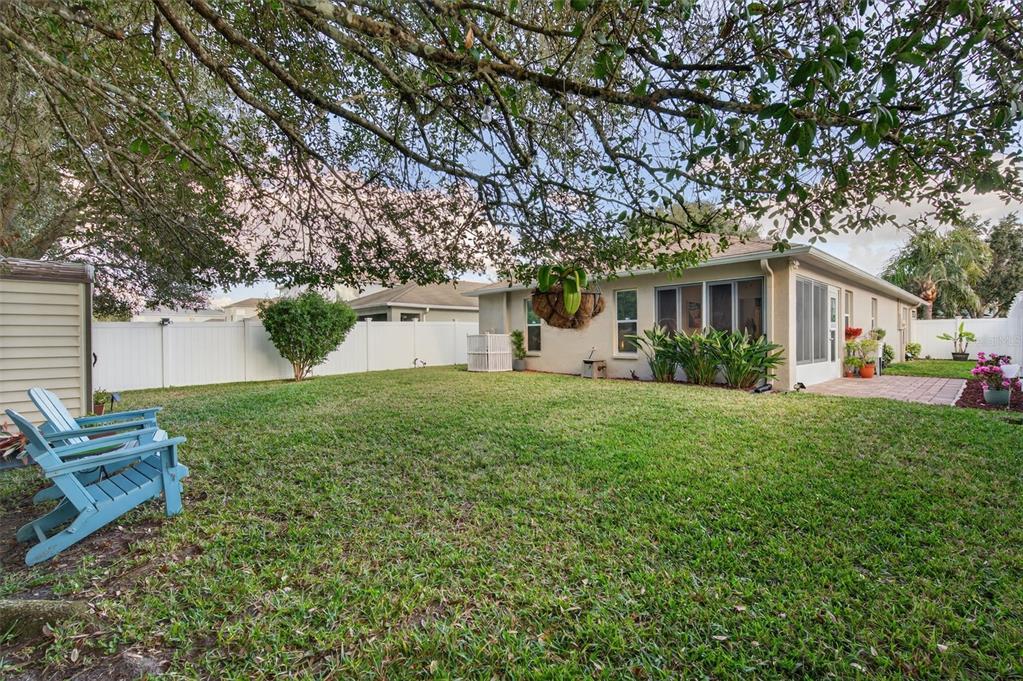 12629 White Bluff Road Hudson, FL 34669 - Photo 26 of 38 a front view of house with a garden