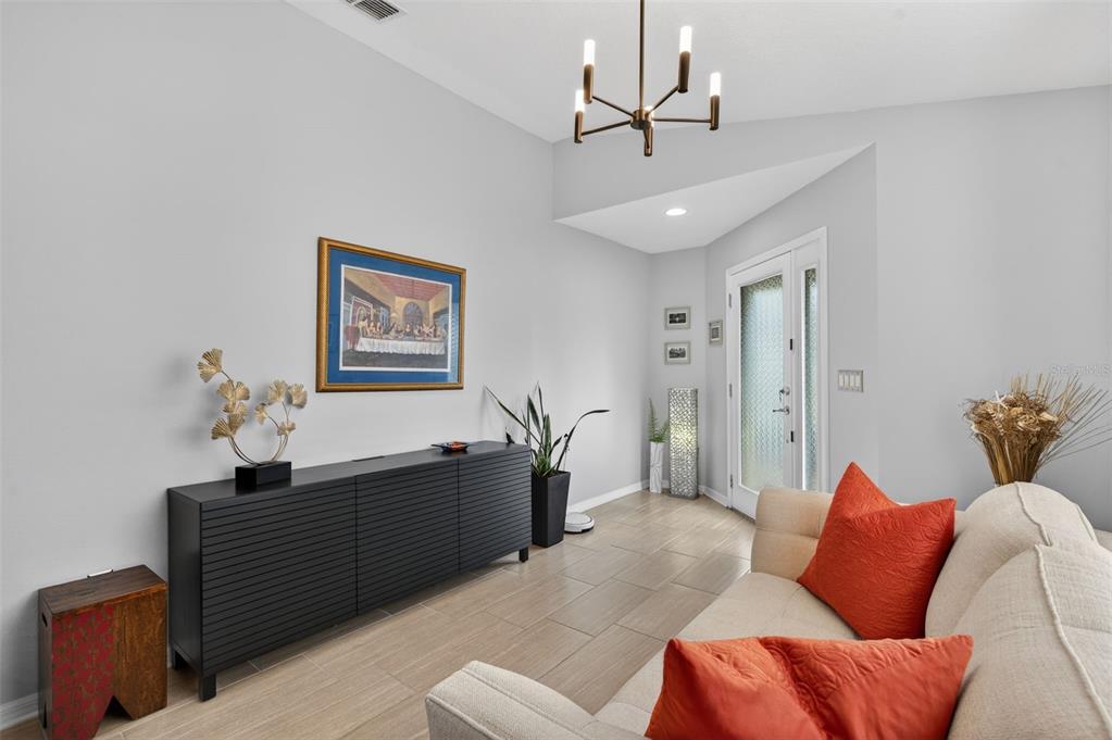 12629 White Bluff Road Hudson, FL 34669 - Photo 3 of 38 a living room with furniture