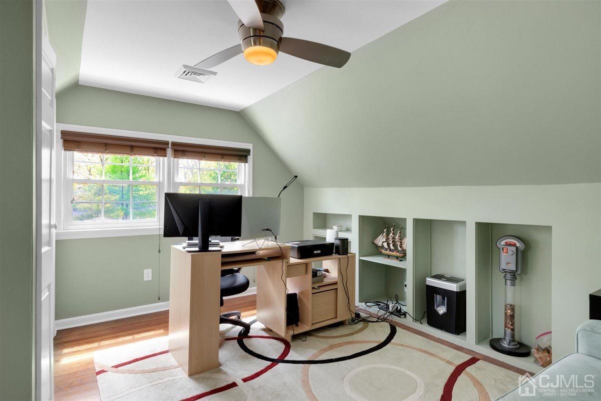 23 Southfield Road Edison, NJ 08820 - Photo 42 of 57 a workspace with furniture hardwood and a window