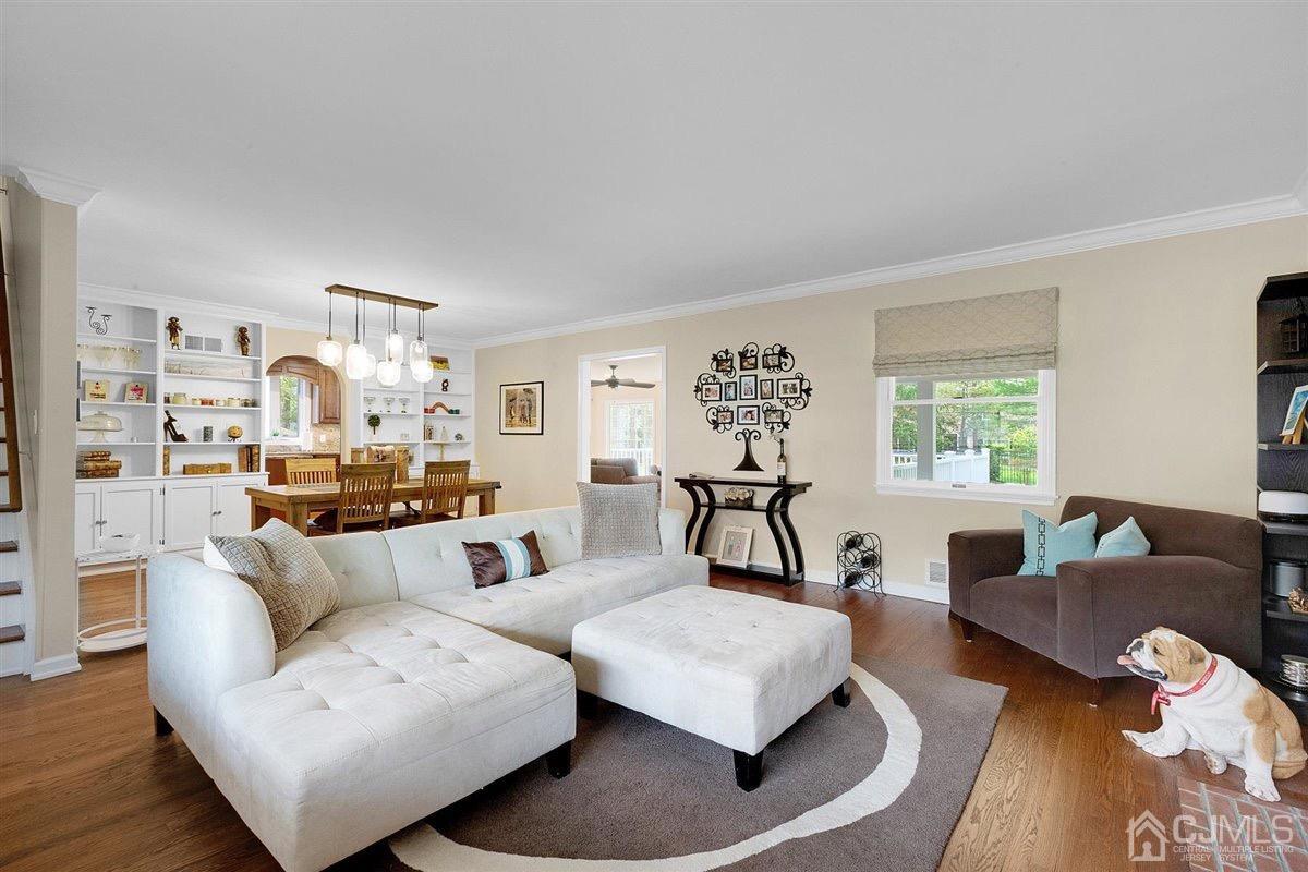 23 Southfield Road Edison, NJ 08820 - Photo 7 of 57 a living room with furniture and a table
