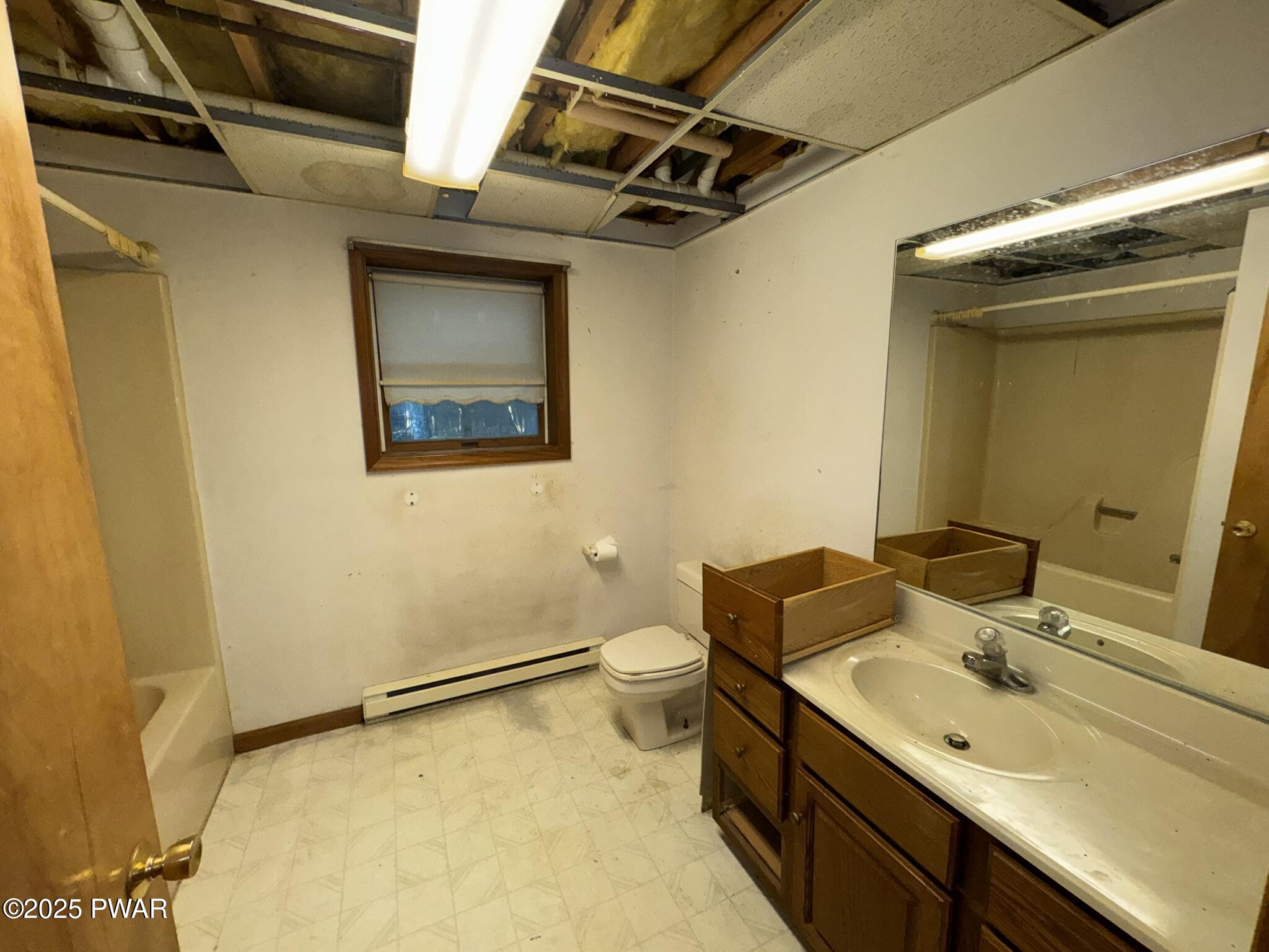 21 Tuthill Road Waymart, PA 18472 - Photo 30 of 49 a bathroom with a sink and mirror