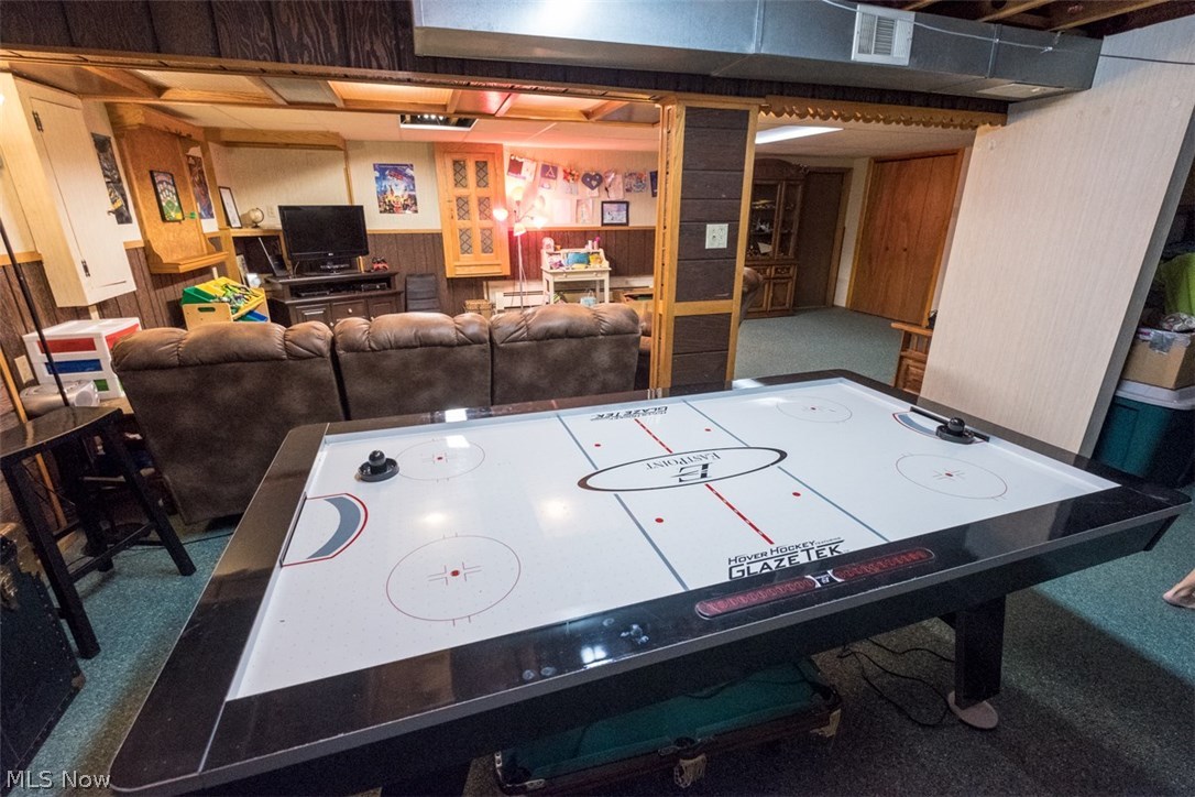 928 Upton Road Youngstown, OH 44509 - Photo 22 of 34 Basement rec room and still lots of storage area