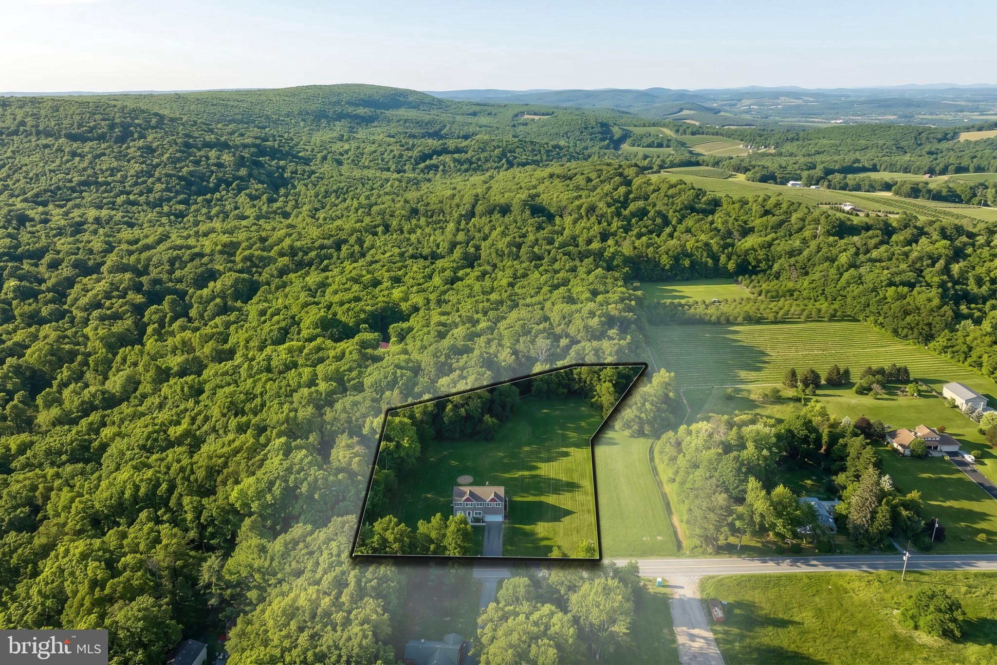2741 Cold Springs Road Orrtanna, PA 17353 - Photo 4 of 52 an aerial view of a house with a yard and lake view