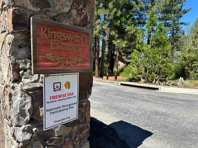 a sign on the side of a street