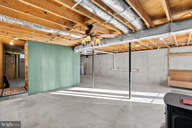 a view of a chairs and table in the patio