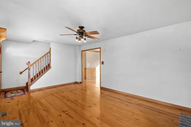 a view of a living room with a large window