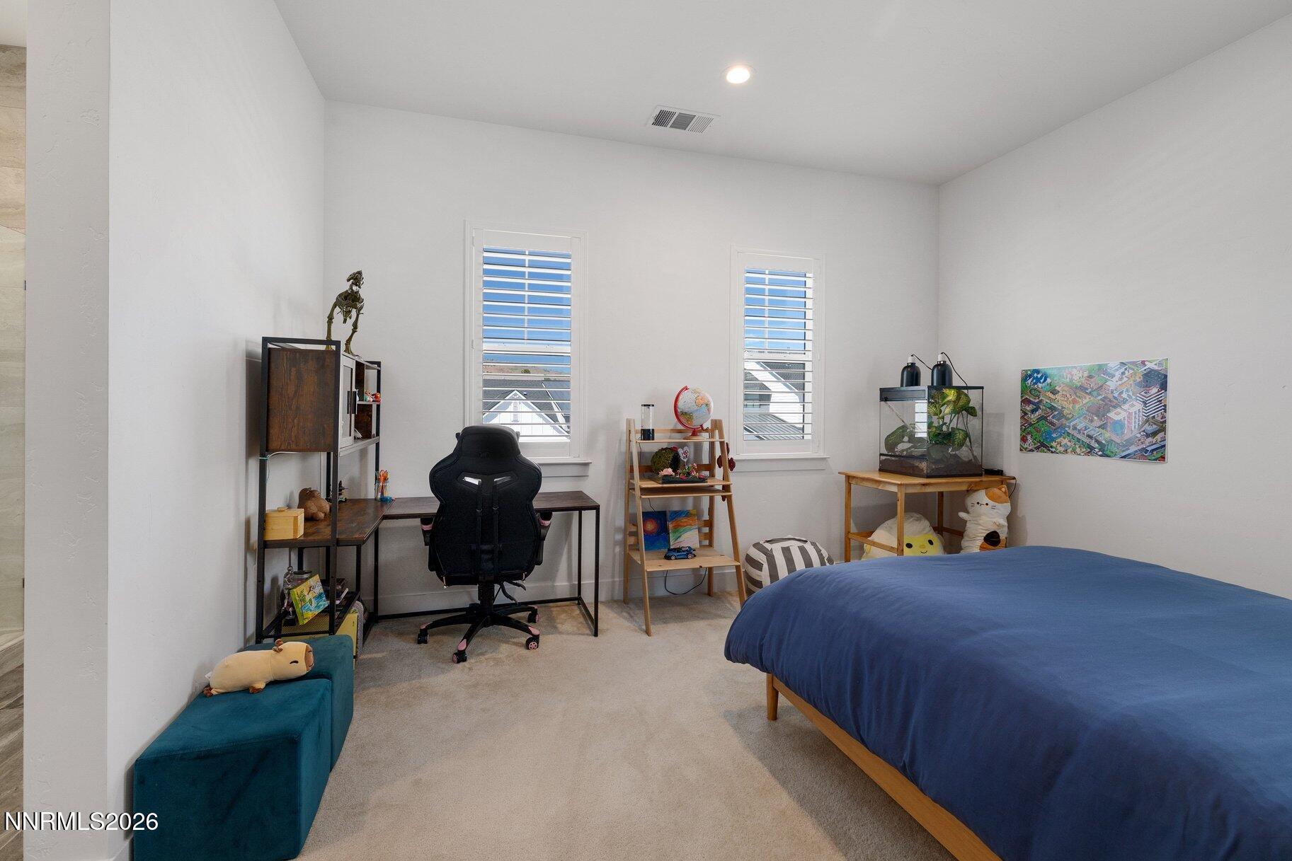 6110 South Pleasant Oak Trail Reno, NV 89511 - Photo 30 of 66 a bed room with a bed and furniture