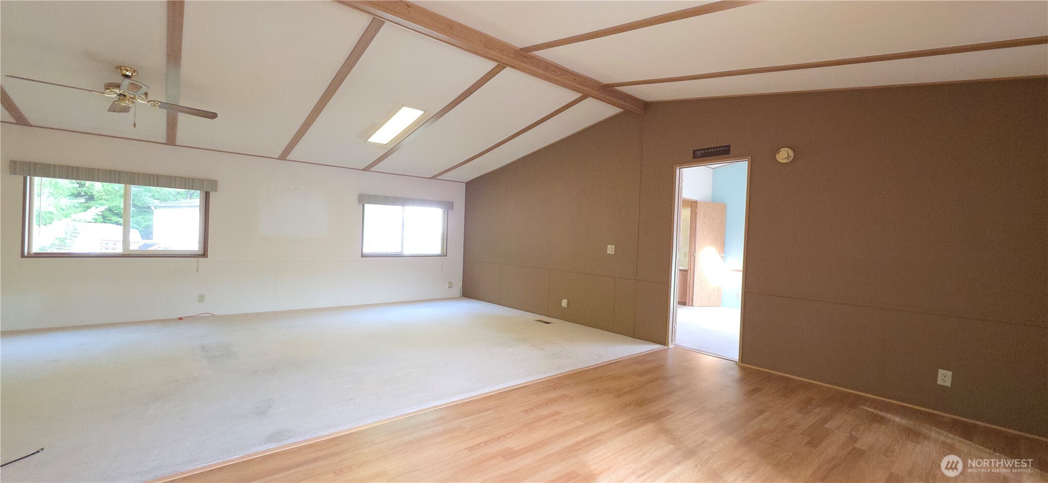 17 Rustemeyer Road, Unit 10 Aberdeen, WA 98520 - Photo 8 of 22 a view of empty room with windows
