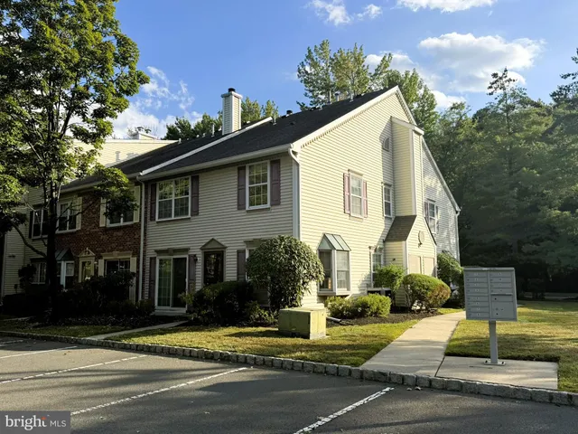 a view of a house with a street