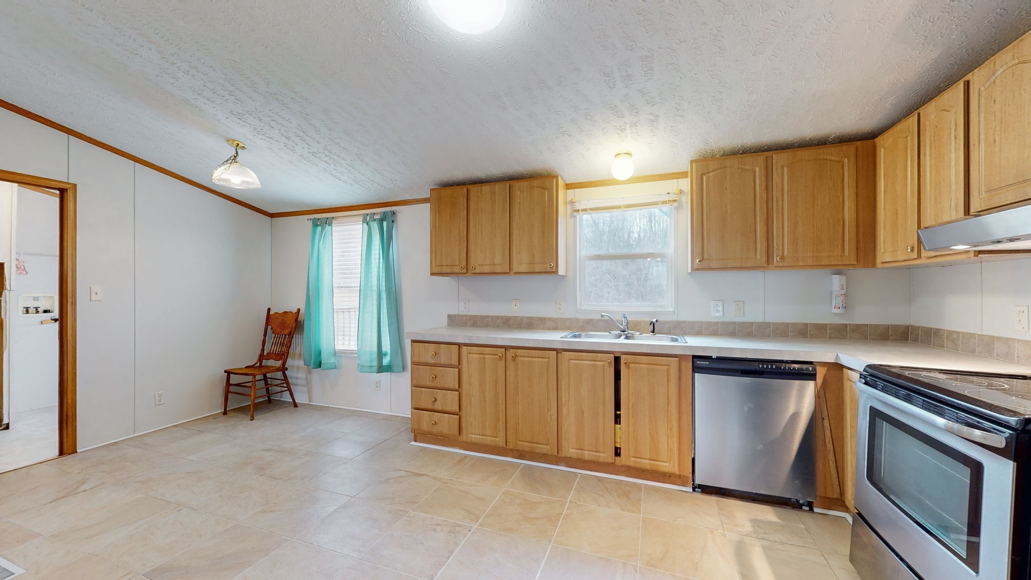 1118 Drake Road Clarksville, TN 37043 - Photo 12 of 38 a kitchen with cabinets and appliances