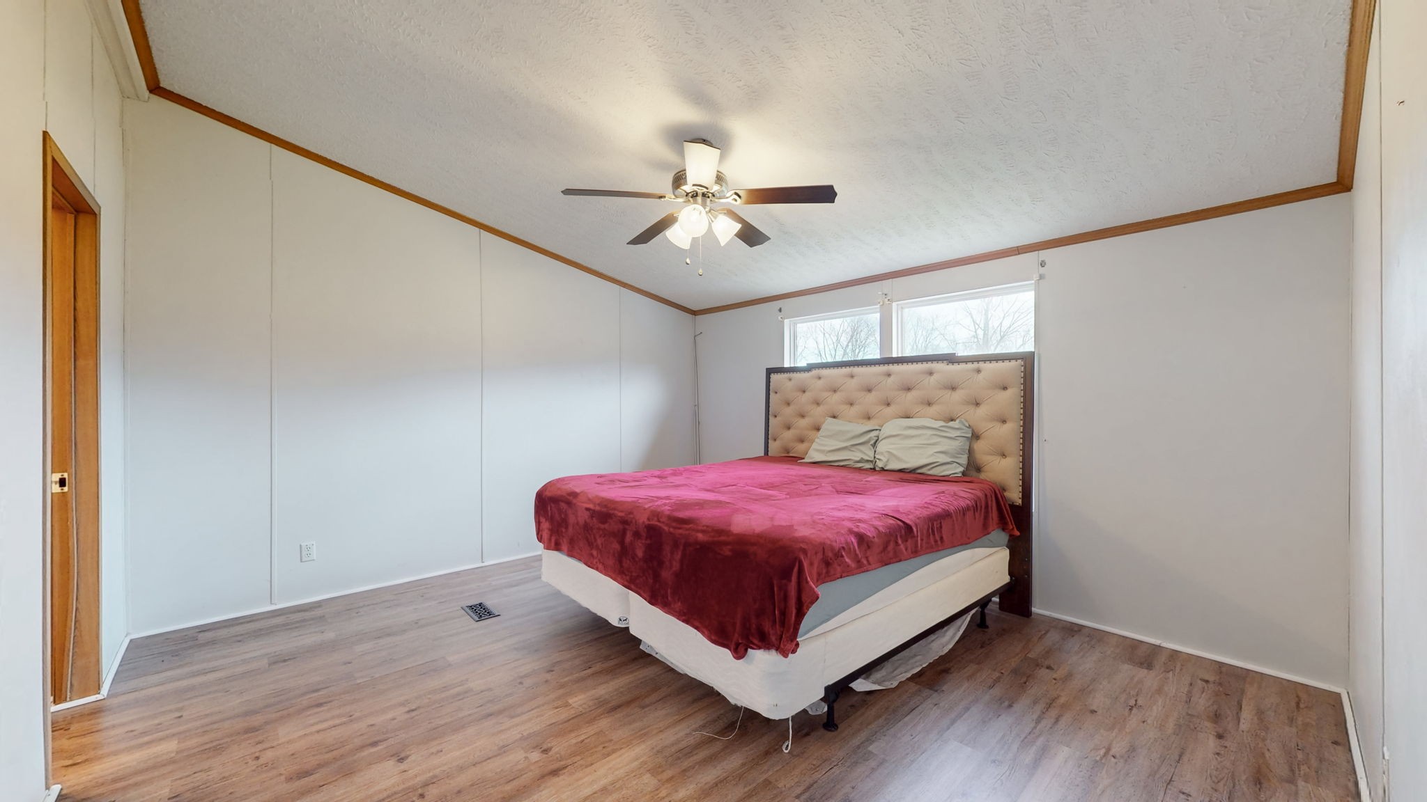 1118 Drake Road Clarksville, TN 37043 - Photo 15 of 38 a bedroom with a bed and a chandelier