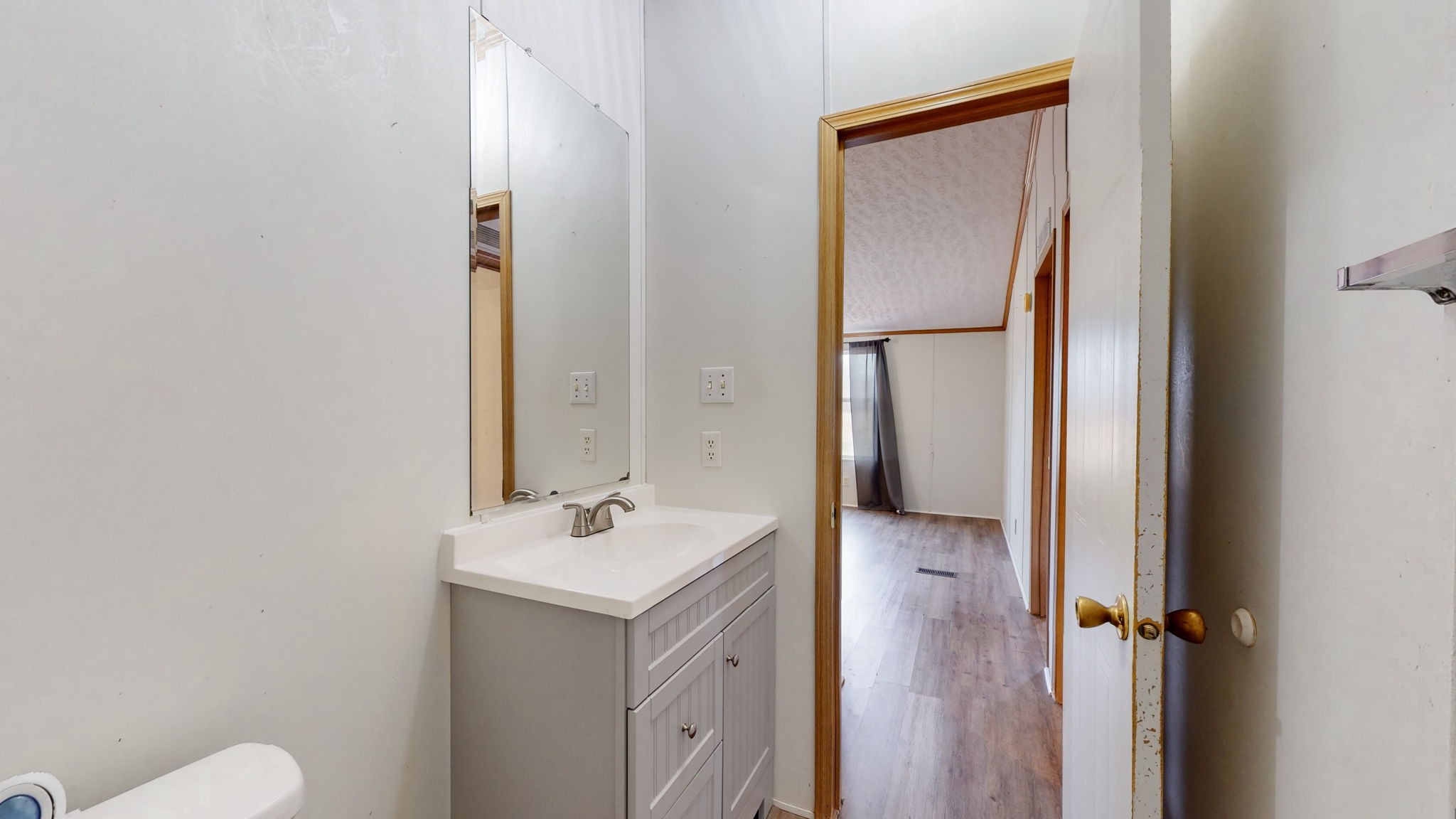 1118 Drake Road Clarksville, TN 37043 - Photo 23 of 38 a bathroom with a bathtub shower sink vanity and toilet