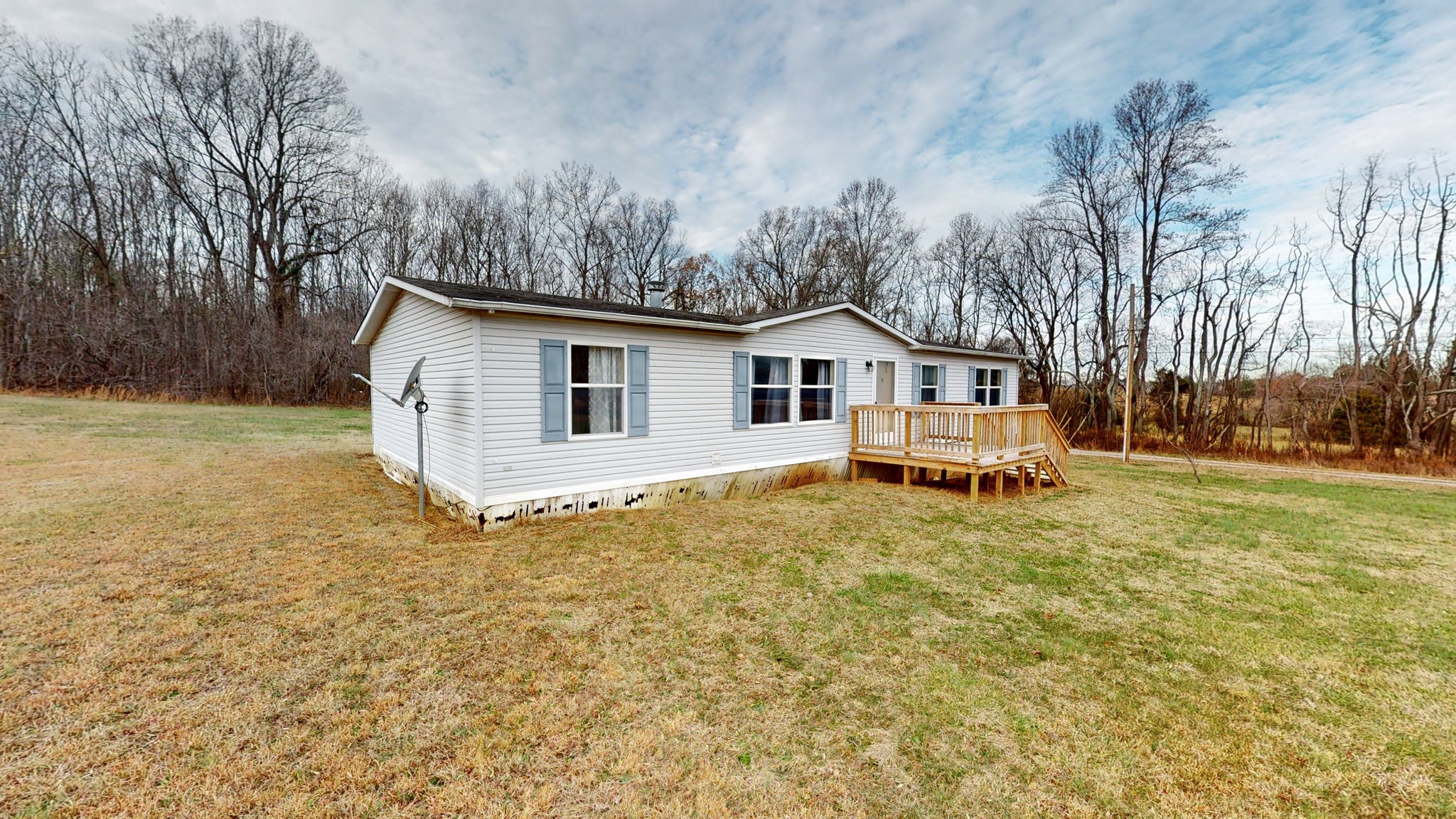 1118 Drake Road Clarksville, TN 37043 - Photo 25 of 38 a white house that has a tree in front of it