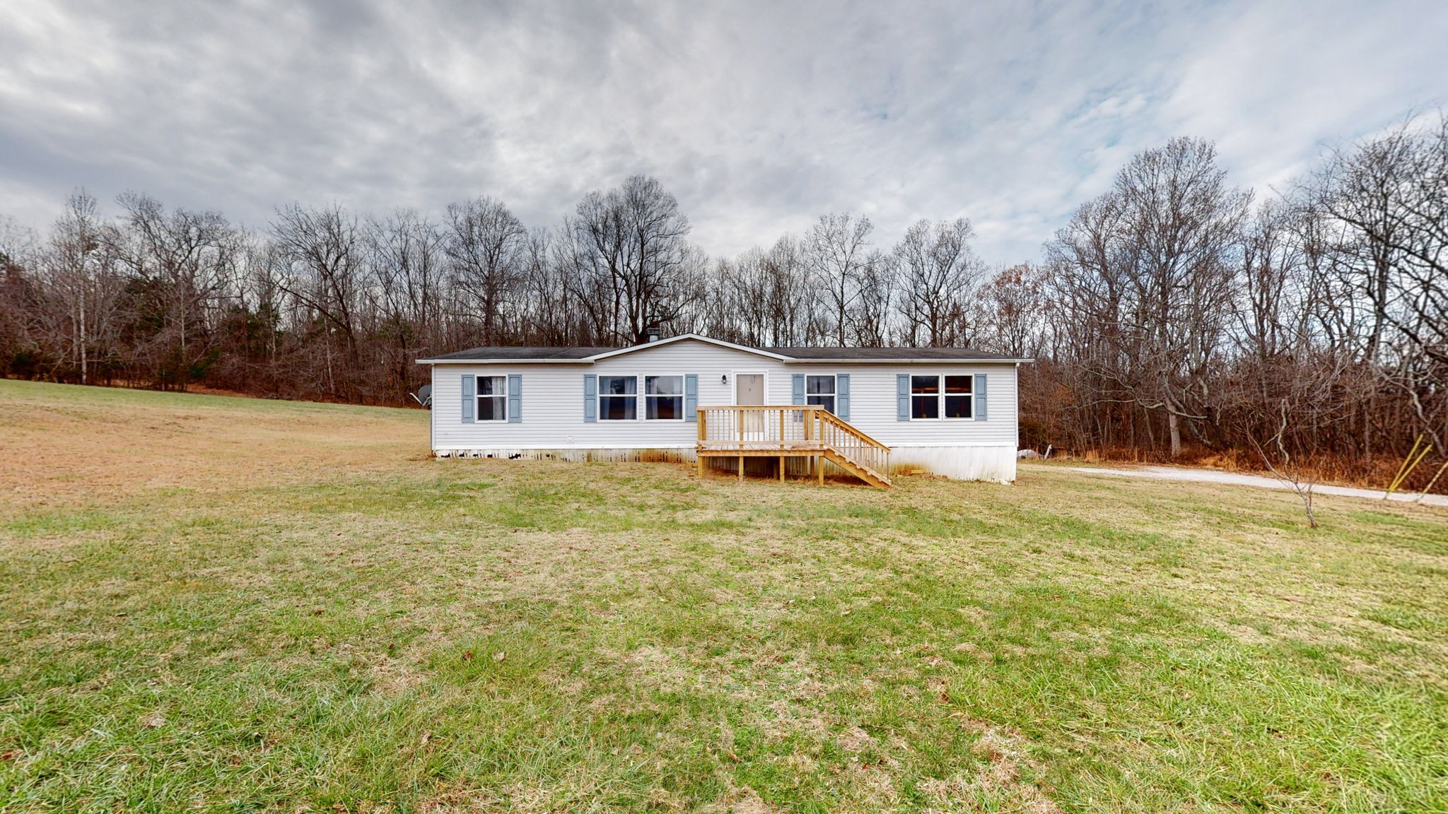 1118 Drake Road Clarksville, TN 37043 - Photo 27 of 38 a front view of house with yard and trees in the background
