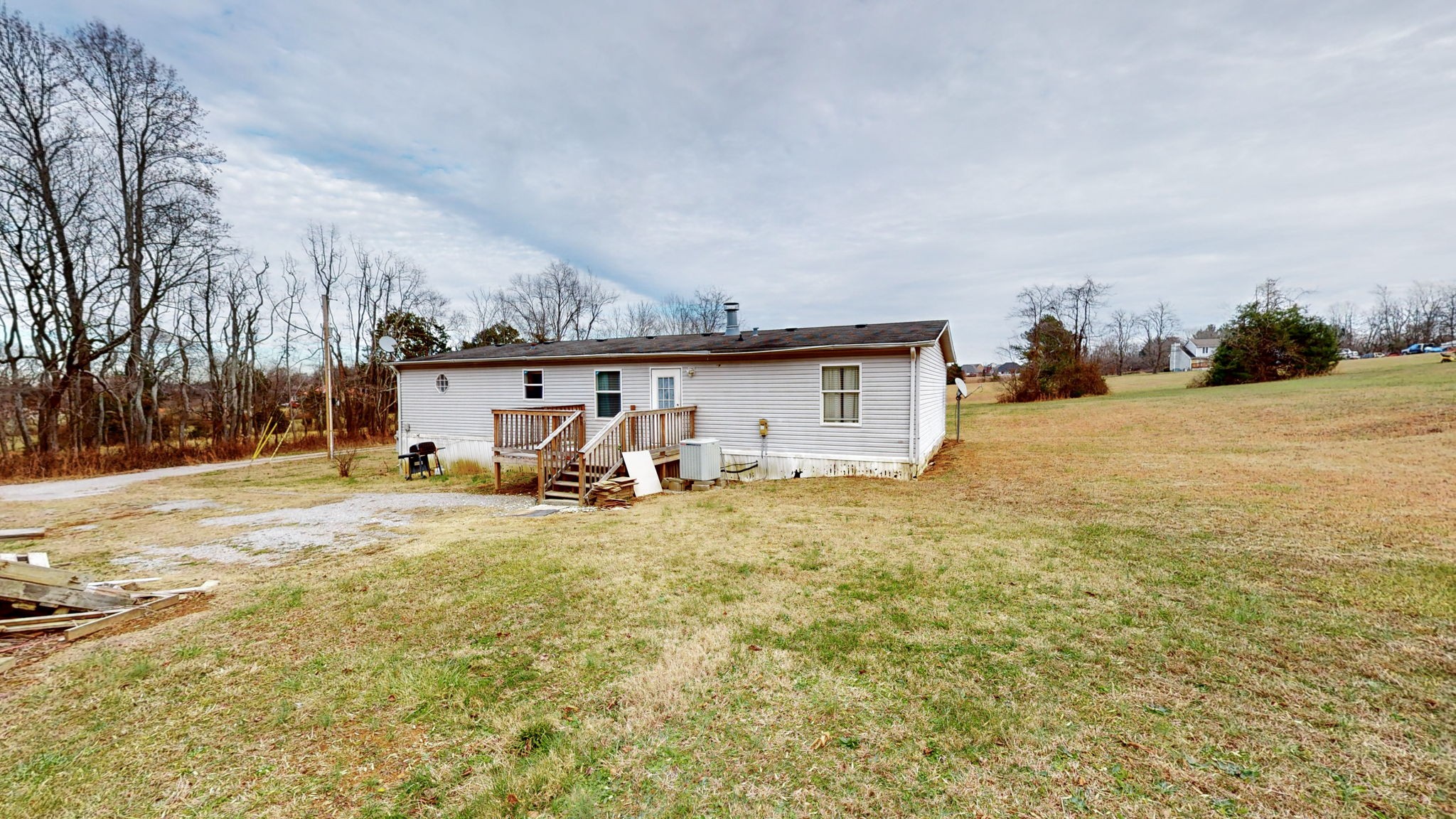 1118 Drake Road Clarksville, TN 37043 - Photo 32 of 38 a view of a house with a yard and garage