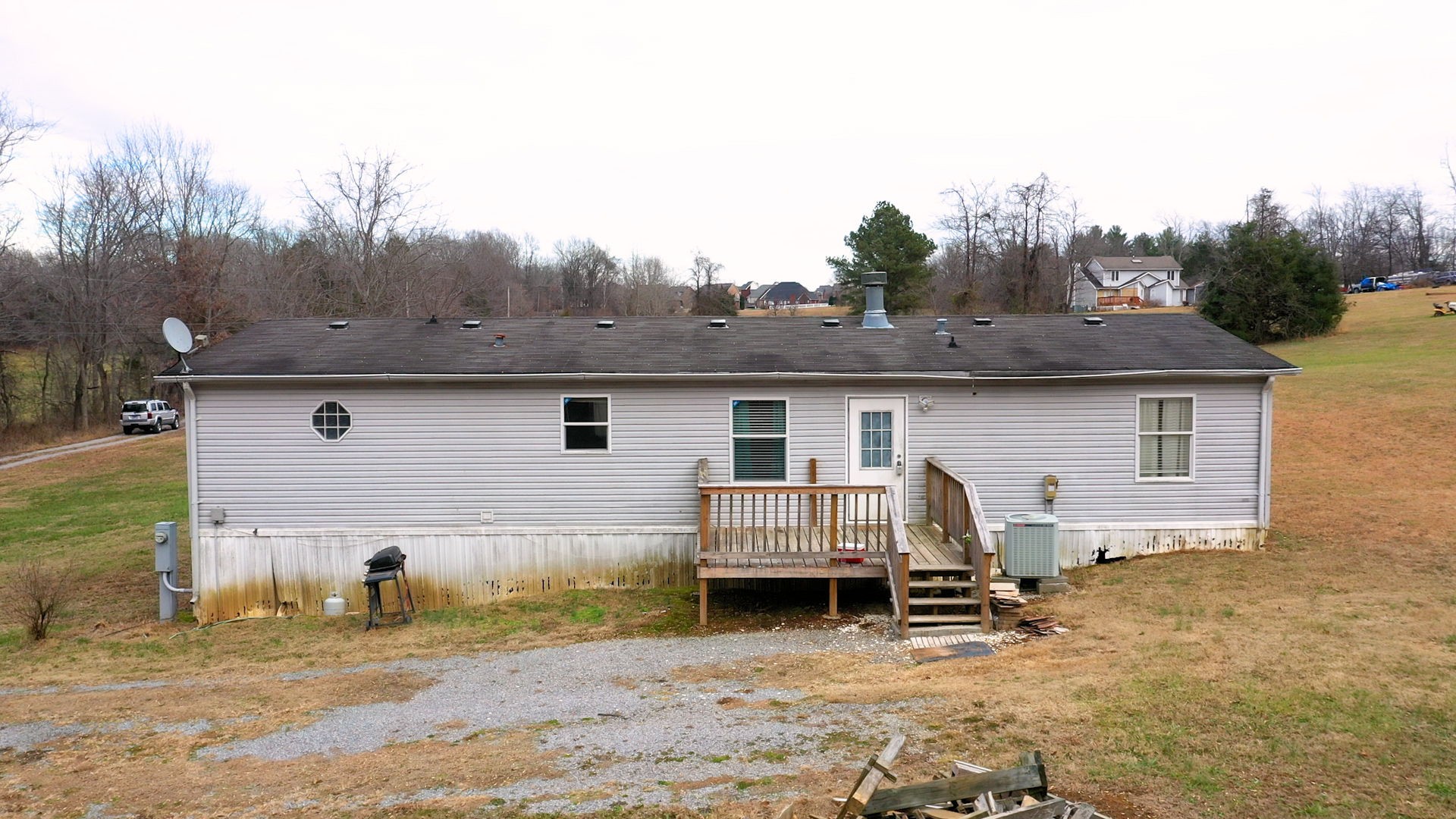 1118 Drake Road Clarksville, TN 37043 - Photo 36 of 38 a view of a house with a backyard and trees