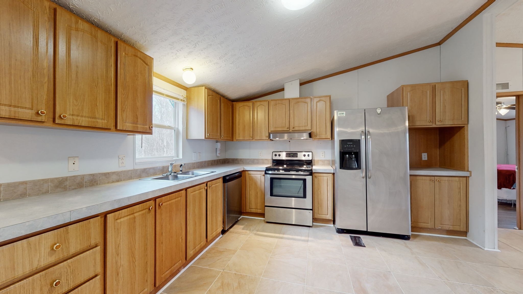 1118 Drake Road Clarksville, TN 37043 - Photo 4 of 38 a kitchen with stainless steel appliances granite countertop a refrigerator sink and stove