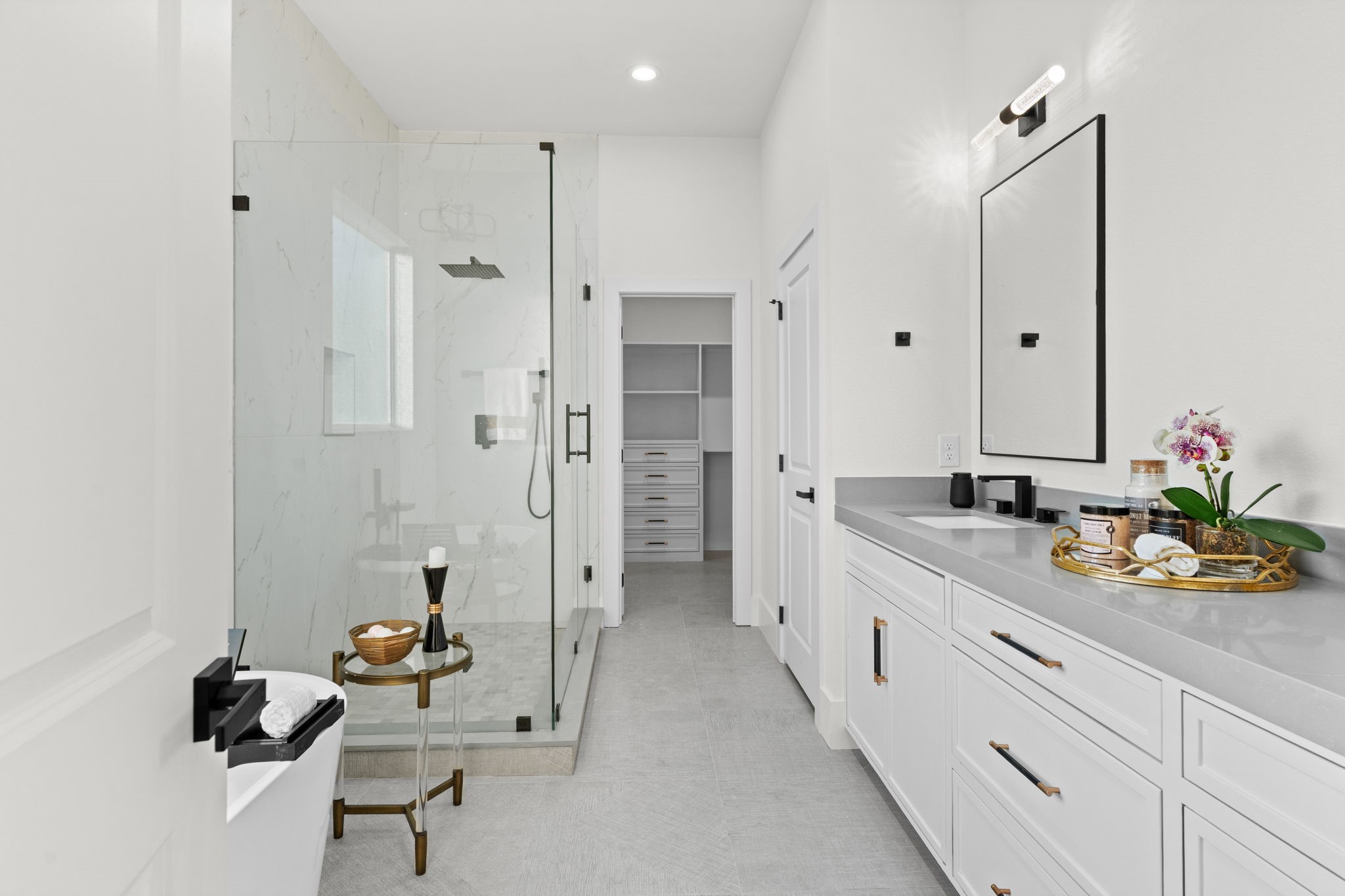 1622 Mable Street Houston, TX 77023 - Photo 18 of 25 a bathroom with a double vanity sink mirror and shower