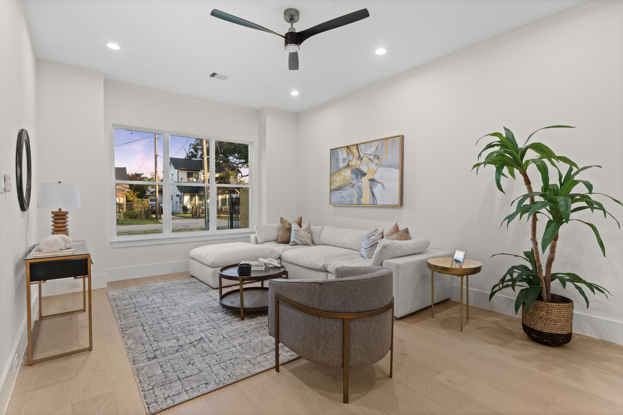 1622 Mable Street Houston, TX 77023 - Photo 4 of 25 a living room with furniture potted plant and a table