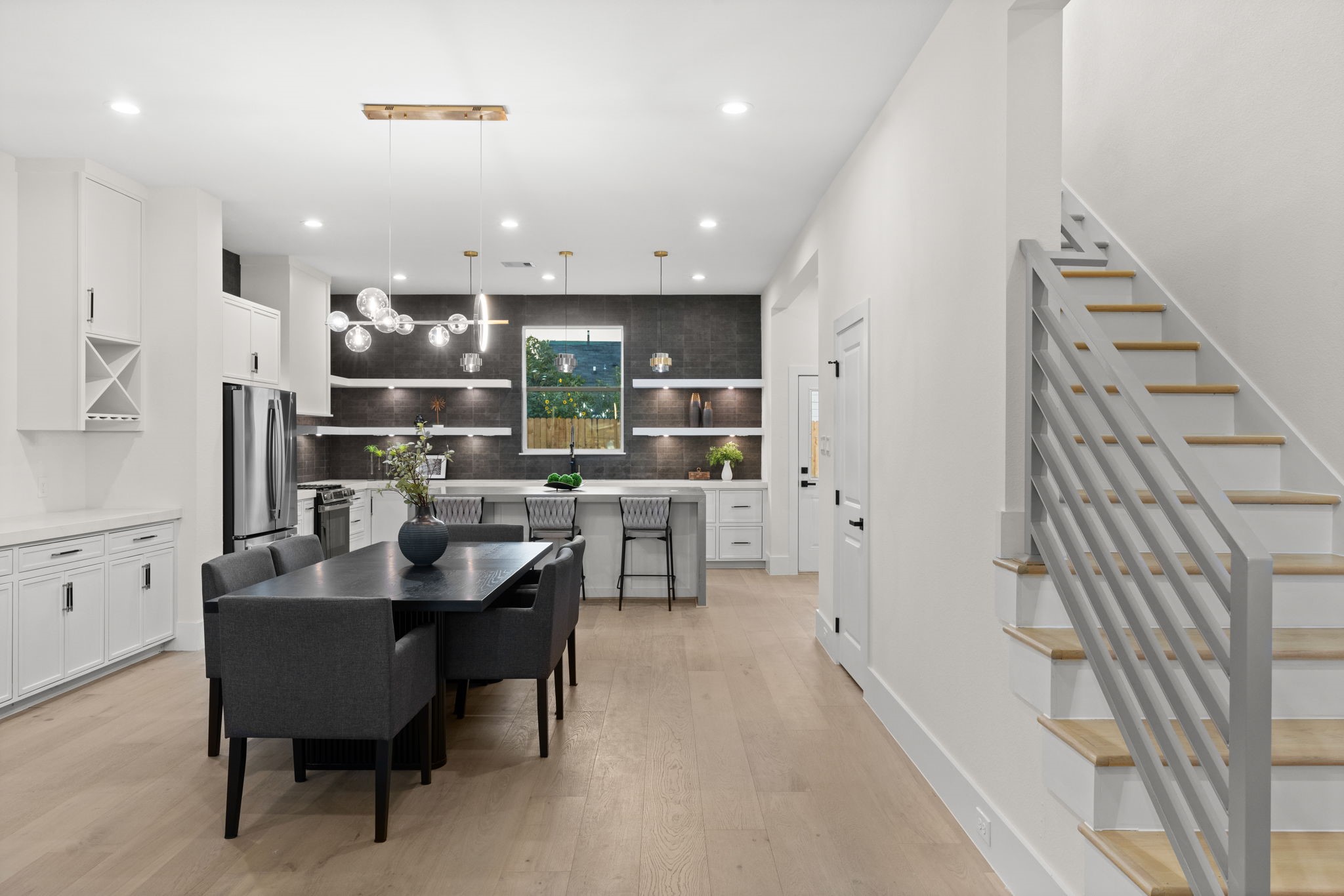 1622 Mable Street Houston, TX 77023 - Photo 5 of 25 a dining room with furniture and a chandelier