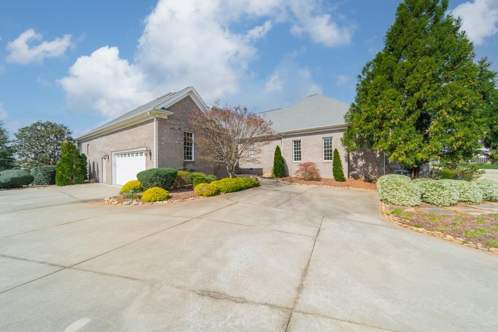 180 Chandelle Ridge Drive Woodruff, SC 29388 - Photo 14 of 48 a view of backyard of a house