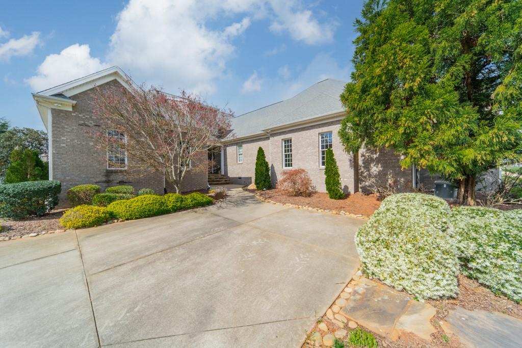 180 Chandelle Ridge Drive Woodruff, SC 29388 - Photo 15 of 48 a view of a house with a street