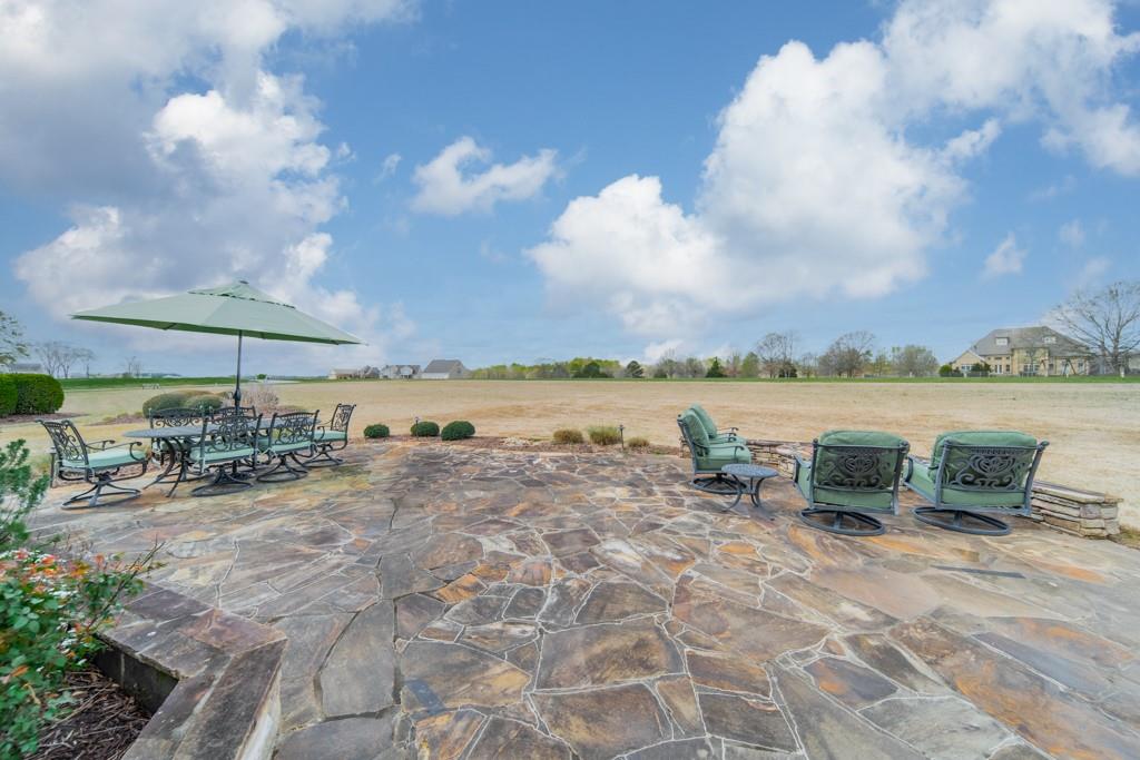 180 Chandelle Ridge Drive Woodruff, SC 29388 - Photo 20 of 48 a view of a lake with sitting area