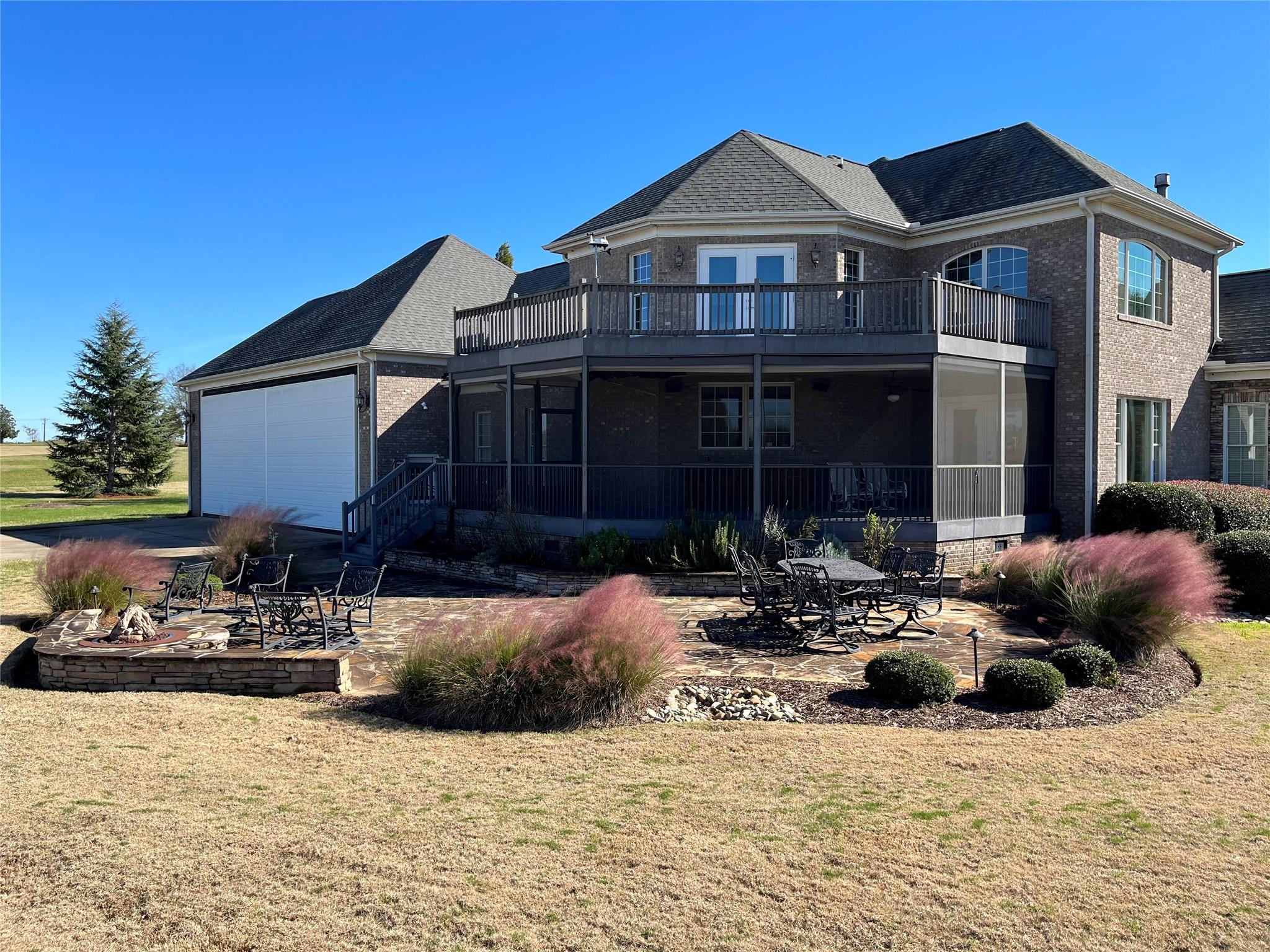 180 Chandelle Ridge Drive Woodruff, SC 29388 - Photo 2 of 48 a front view of a house with a yard
