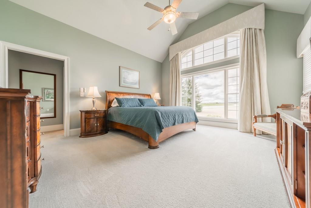 180 Chandelle Ridge Drive Woodruff, SC 29388 - Photo 31 of 48 a living room with a bed furniture and a large window