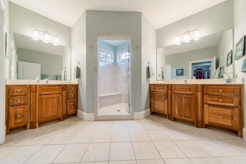 180 Chandelle Ridge Drive Woodruff, SC 29388 - Photo 32 of 48 a spacious bathroom with a granite countertop sink mirror and