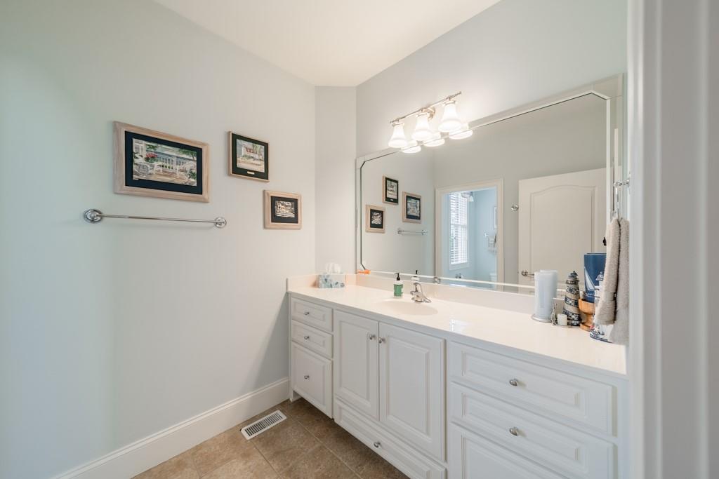 180 Chandelle Ridge Drive Woodruff, SC 29388 - Photo 39 of 48 a bathroom with a double vanity sink and a mirror