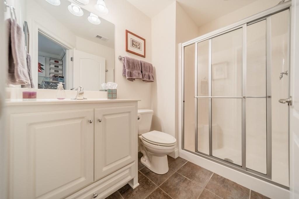 180 Chandelle Ridge Drive Woodruff, SC 29388 - Photo 46 of 48 a bathroom with a sink toilet and shower