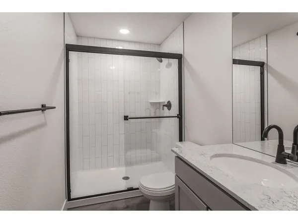 a kitchen with cabinets a sink and appliances