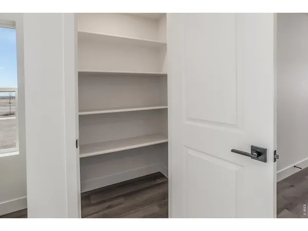 a kitchen with a sink stove and microwave