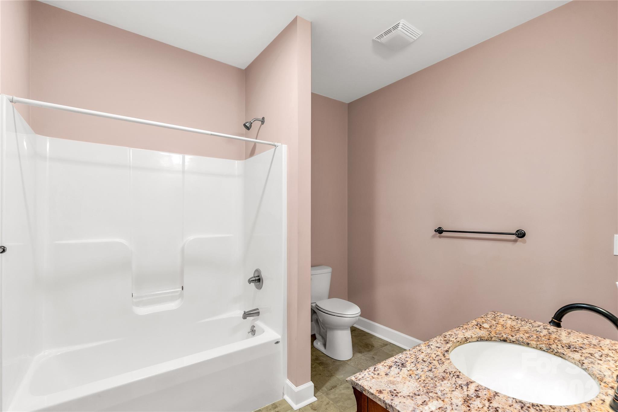 3034 Mulberry Lane Lancaster, SC 29720 - Photo 14 of 30 a bathroom with a granite countertop sink toilet and shower