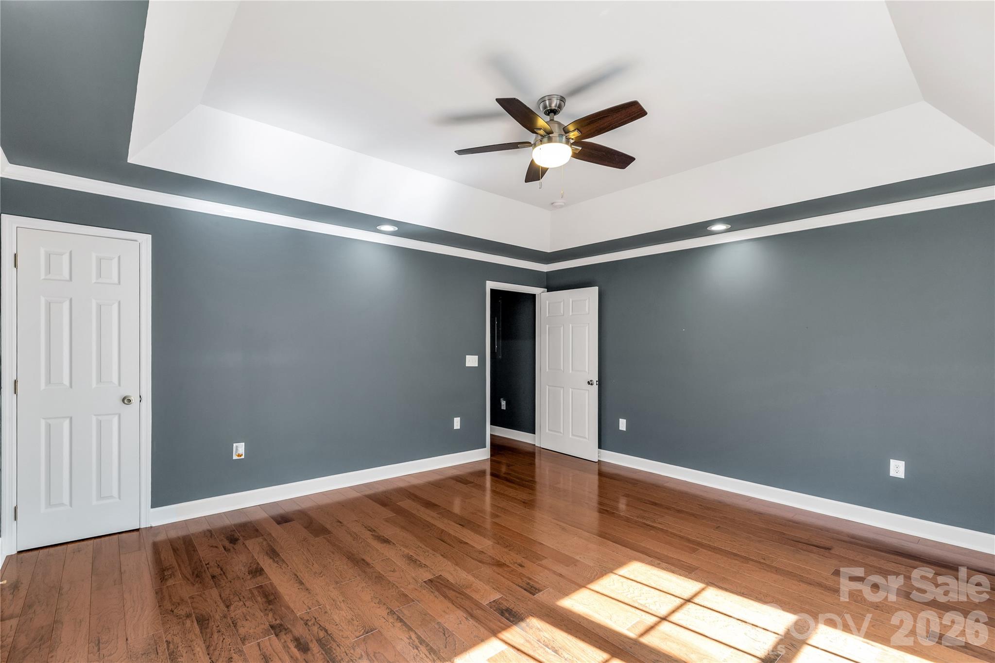 3034 Mulberry Lane Lancaster, SC 29720 - Photo 15 of 30 a view of an empty room with wooden floor and a window