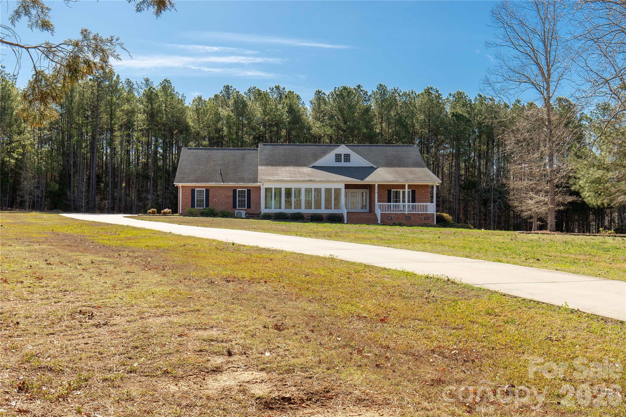 3034 Mulberry Lane Lancaster, SC 29720 - Photo 24 of 30 a view of a house with a swimming pool