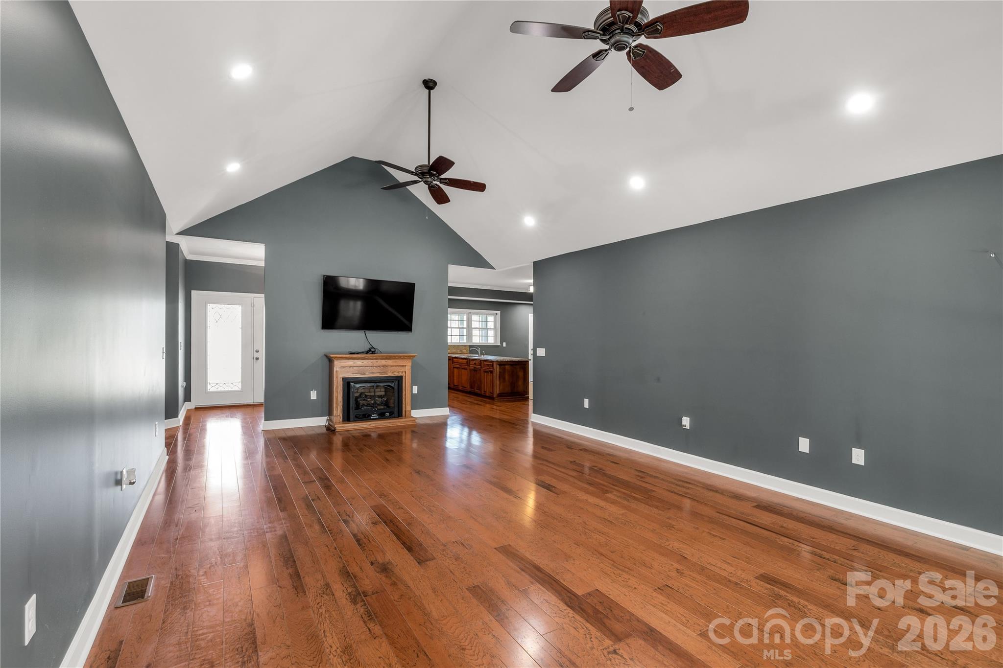 3034 Mulberry Lane Lancaster, SC 29720 - Photo 6 of 30 a view of a room with chandelier and wooden floor