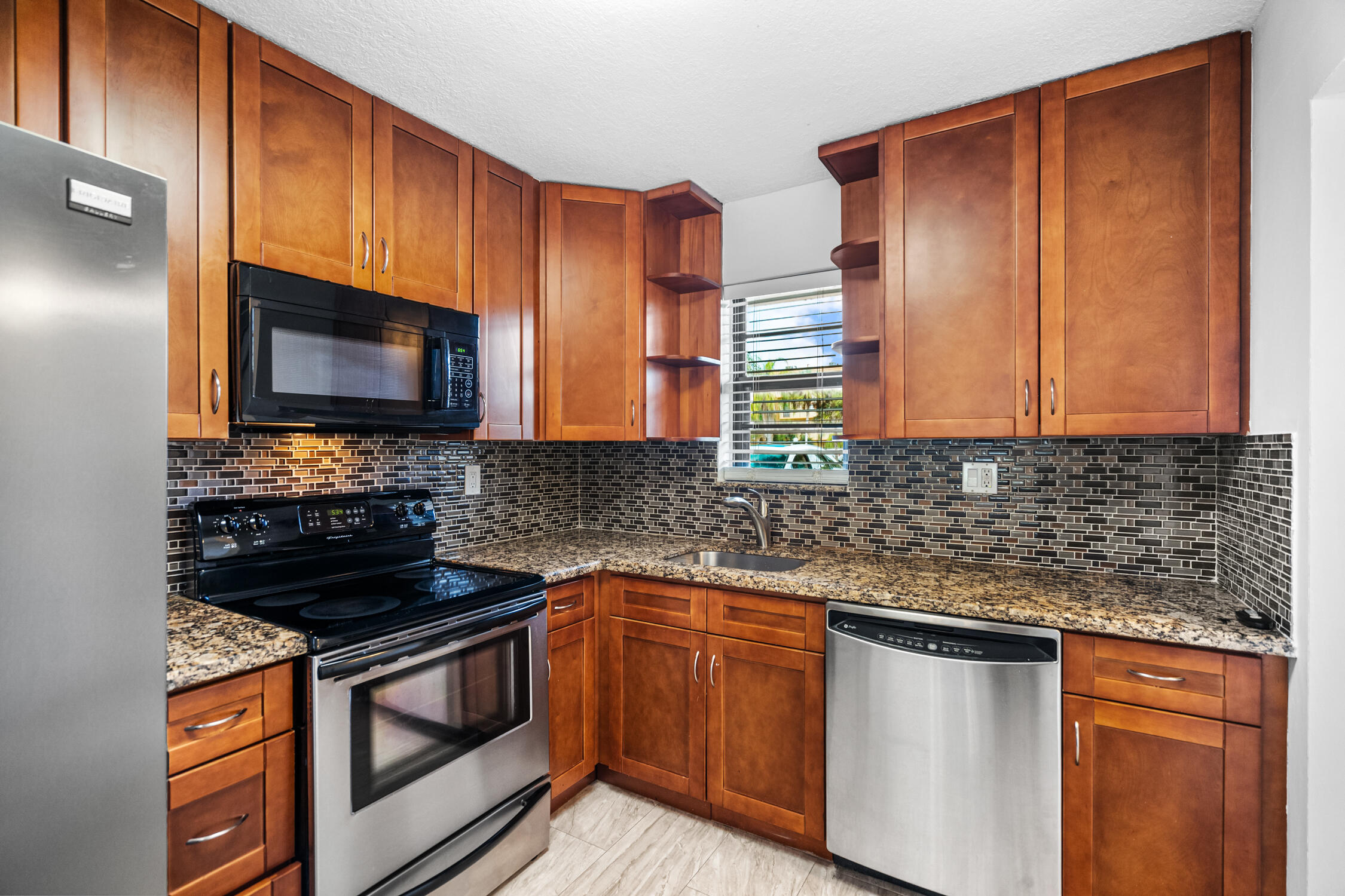 9370 Southwest 8th Street, Unit 111 Boca Raton, FL 33428 - Photo 1 of 26 Kitchen