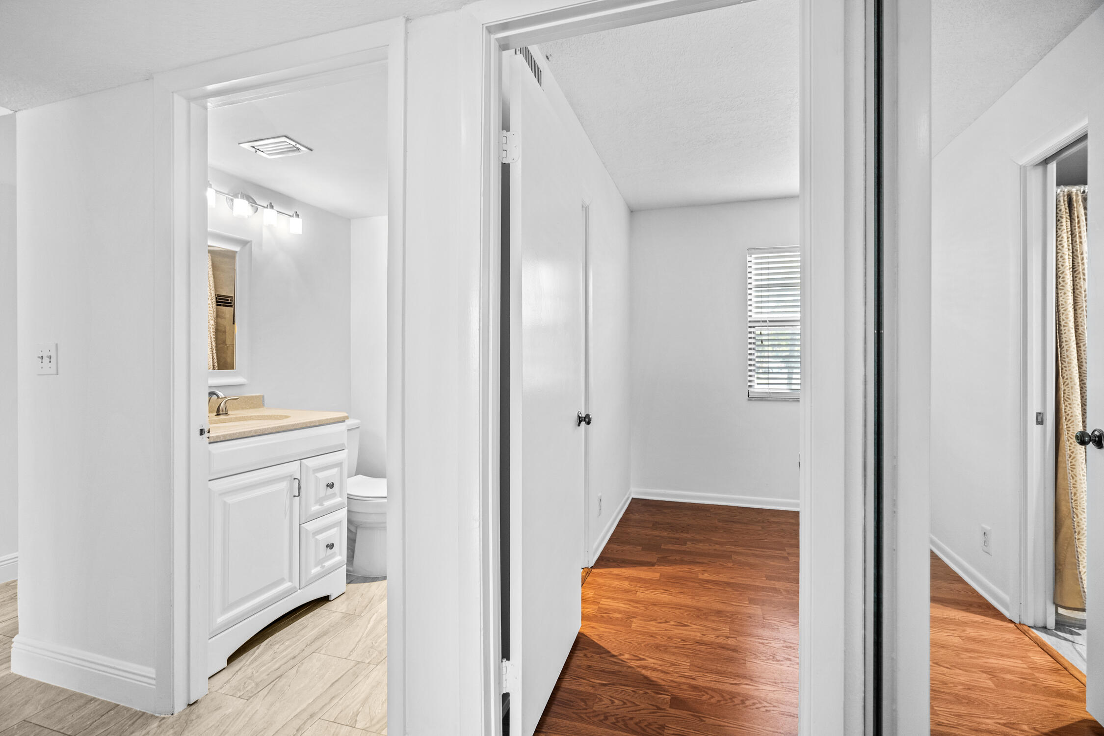 9370 Southwest 8th Street, Unit 111 Boca Raton, FL 33428 - Photo 20 of 26 Hall to Bath 2