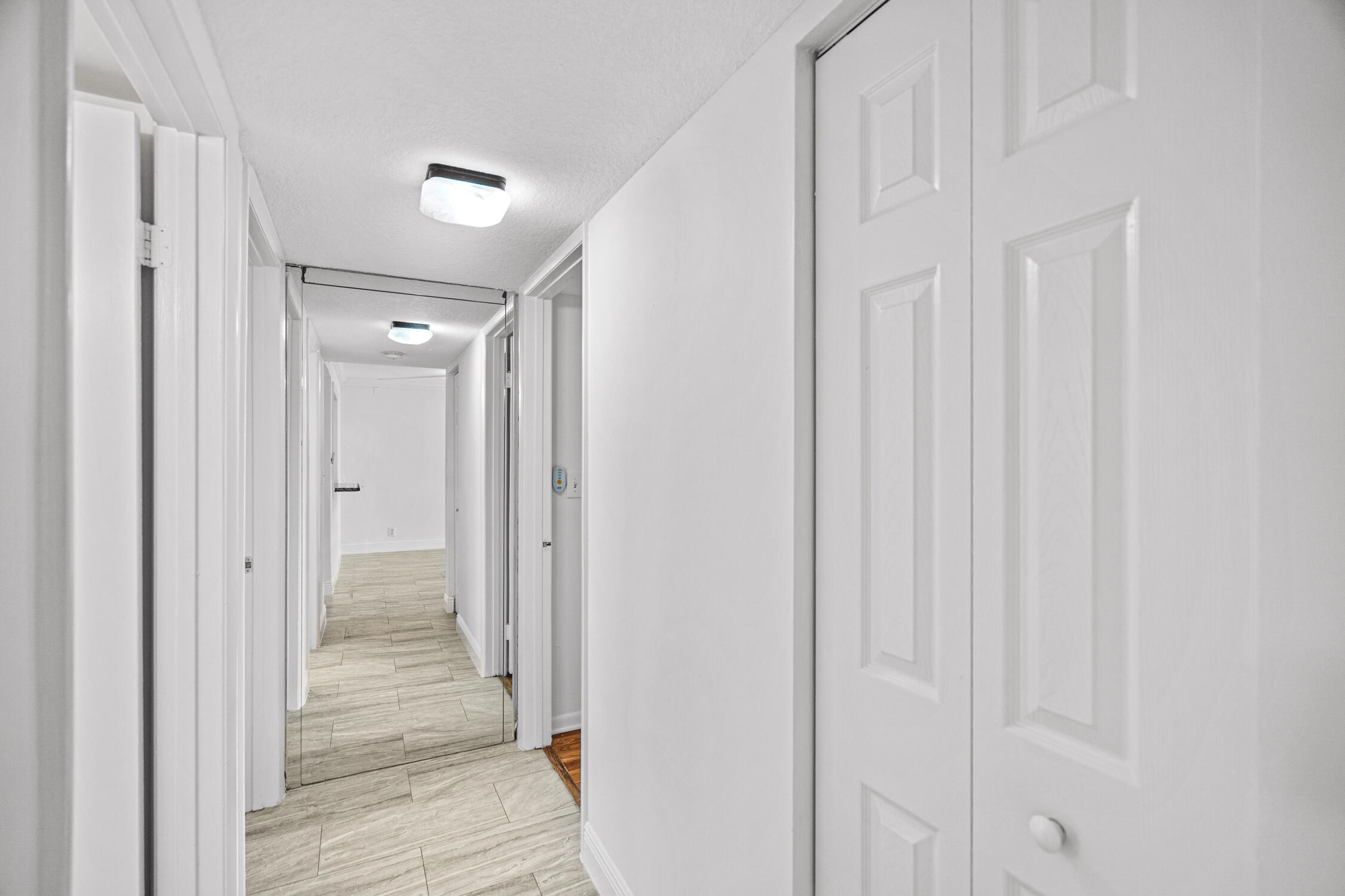 9370 Southwest 8th Street, Unit 111 Boca Raton, FL 33428 - Photo 10 of 26 Hall to bedrooms