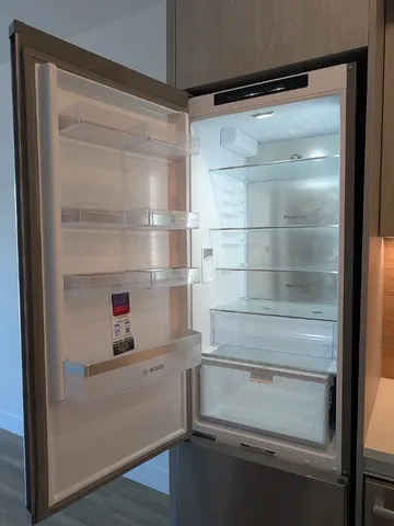 a view of balcony with wooden floor