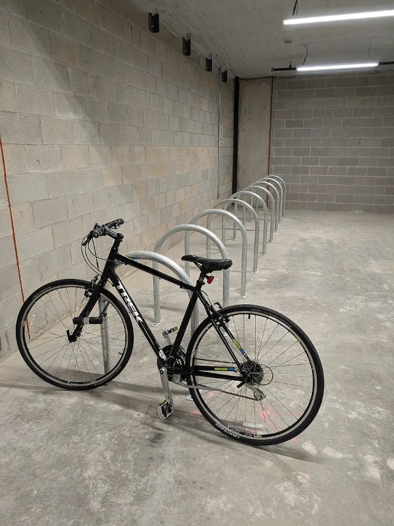 4315 South Congress Avenue, Unit 233 Austin, TX 78745 - Photo 24 of 25 a bathroom with a mirror and white walls