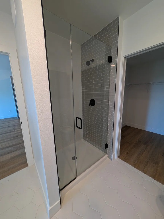 4315 South Congress Avenue, Unit 233 Austin, TX 78745 - Photo 9 of 25 a bathroom with a shower and a glass door