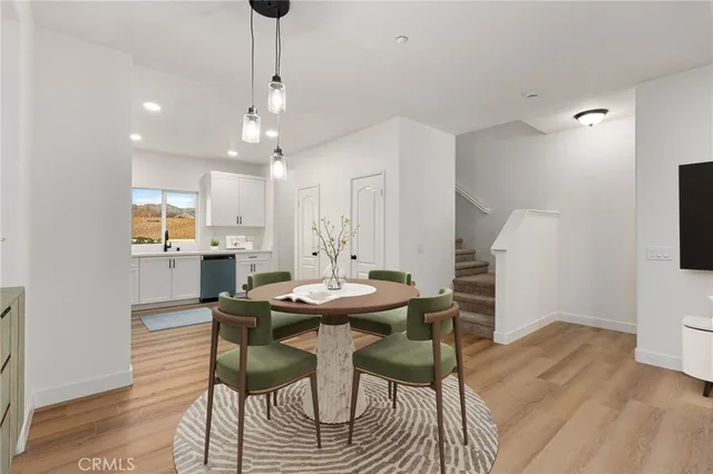 a kitchen with a refrigerator stove and microwave