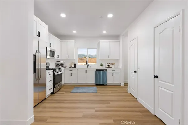 a view of a chair and table in a kitchen