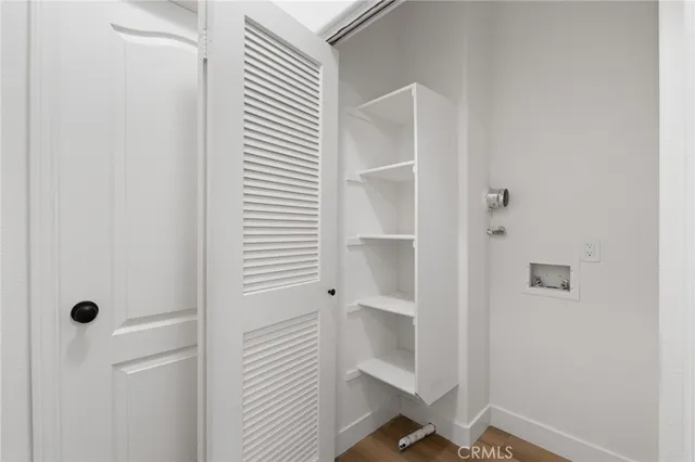 a front view of a multi story residential apartment building with a yard