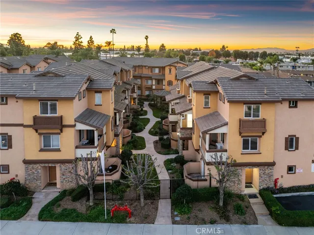 a view of a city with tall buildings